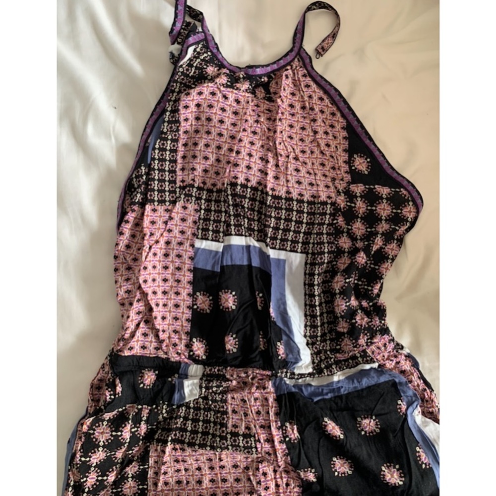 Mixed pattern jumpsuit, racerback/halter neckline.